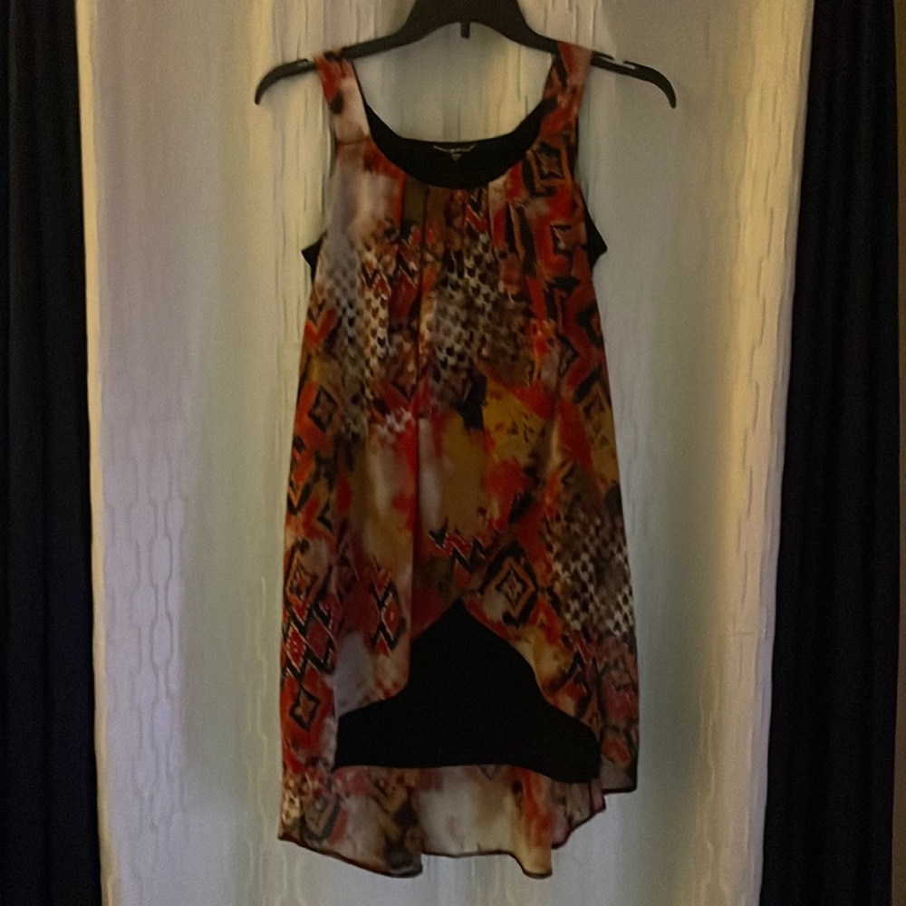 Cute orange and black shirt/ dress.